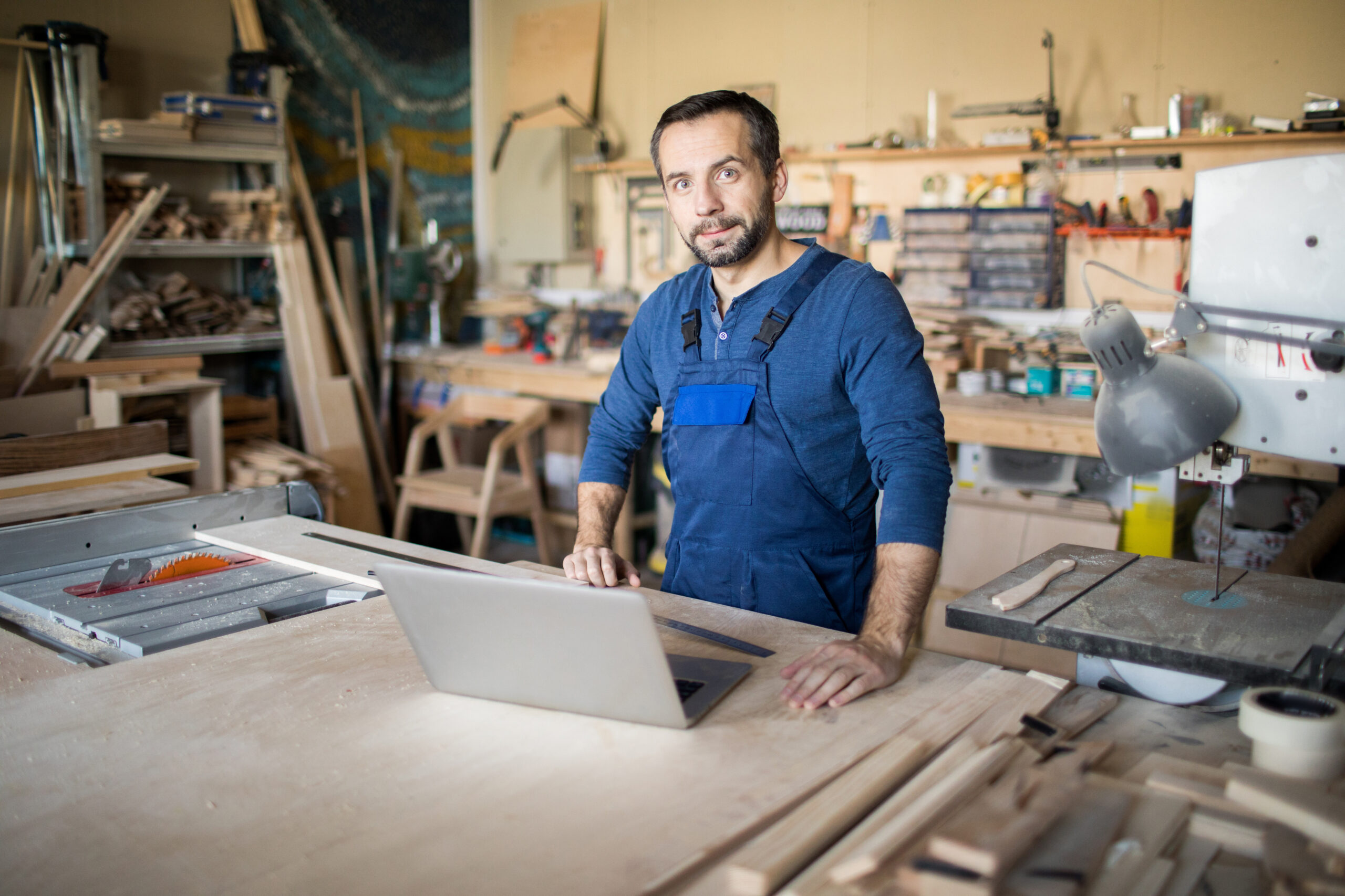 Mature Carpenter Posing in Workshop